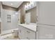 Elegant bathroom featuring subway tile shower, white vanity, and modern fixtures at 2122 Goose Creek Farm Ln, Indian Trail, NC 28079