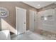 Bathroom featuring glass enclosed shower, decorative tiling, and a neutral color palette at 2122 Goose Creek Farm Ln, Indian Trail, NC 28079