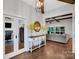 Inviting foyer with hardwood floors, a console table, and views into other living spaces at 2122 Goose Creek Farm Ln, Indian Trail, NC 28079
