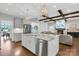 Open floor plan featuring a spacious kitchen with a large island, stainless appliances and open to the living area at 2122 Goose Creek Farm Ln, Indian Trail, NC 28079