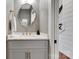 Stylish powder room featuring modern vanity, elegant mirror, and designer accents at 2122 Goose Creek Farm Ln, Indian Trail, NC 28079