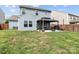 Spacious backyard with a well-maintained lawn, a patio and a charming gazebo with outdoor furniture at 214 Hidden Lakes Rd, Statesville, NC 28677