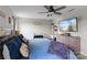 Bedroom featuring a large bed, accent pillows, a dresser, and a TV at 214 Hidden Lakes Rd, Statesville, NC 28677
