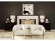 The bedroom is styled with an artful black accent wall that creates a bold and contemporary look at 2249 Moon Crest Rd, Lancaster, SC 29720