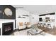 Open concept living room with hardwood floors, modern fireplace, and barstool seating at the kitchen island at 235 Parker Claire Ln, Kings Mountain, NC 28086