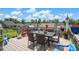 Outdoor deck offers views of the neighborhood, with ample seating and a grill for backyard cookouts at 2473 Riparian Way, Denver, NC 28037