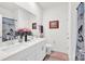 Stylish bathroom with double vanity, modern fixtures, and attractive decor at 2473 Riparian Way, Denver, NC 28037