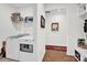 Bright laundry room features modern washer/dryer and shelving for organized storage, with convenient hall access at 2473 Riparian Way, Denver, NC 28037