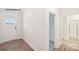 Bright foyer featuring hardwood floors and a doorway leading to a bathroom at 248 Miramar Dr, York, SC 29745