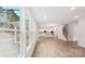 Open living room showcasing wood floors, recessed lighting, leading to a bright kitchen and staircase at 248 Miramar Dr, York, SC 29745