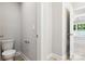A neutral half bathroom with wood-look vinyl flooring at 263 Robinson St, Rock Hill, SC 29730