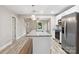 Kitchen island with sink and faucet, granite countertops and stainless steel appliances at 263 Robinson St, Rock Hill, SC 29730