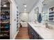 Modern bathroom with dual sinks, marble countertops, and a walk-in shower at 3041 Shallowood Ln, Charlotte, NC 28277
