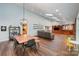 Bright, airy dining room with hardwood floors, skylights, and plenty of room for entertaining guests at 3041 Shallowood Ln, Charlotte, NC 28277