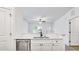 Modern kitchen featuring white cabinets, stainless steel appliances, and an open layout at 354 Moore Ave, Mooresville, NC 28115