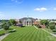 Aerial view of Harrisburg Town Hall surrounded by grass and walkways at 4024 Town Center Rd, Harrisburg, NC 28075