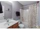 Bathroom featuring vanity sink and a tub with shower at 4024 Town Center Rd, Harrisburg, NC 28075