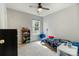 Bedroom featuring a ceiling fan, a window and carpeted floors at 406 Courtland Ct, Kannapolis, NC 28081