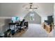 Large bonus room with a ceiling fan, a window and neutral carpeted floors at 406 Courtland Ct, Kannapolis, NC 28081