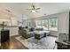 Spacious living room with comfortable seating, large windows, and an open layout perfect for entertaining at 406 Courtland Ct, Kannapolis, NC 28081
