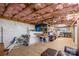 Unfinished basement space showing exposed insulation, work bench and ample storage at 4441 Jim Wise Rd, Lincolnton, NC 28092