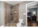 Bathroom with glass shower and view into the primary bedroom at 4441 Jim Wise Rd, Lincolnton, NC 28092
