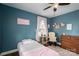 Bedroom with hardwood floors, large windows, pink curtains, and plenty of natural light at 4441 Jim Wise Rd, Lincolnton, NC 28092