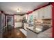 Well-appointed kitchen featuring custom cabinets, stainless steel appliances, and granite countertops, blending style and functionality at 4441 Jim Wise Rd, Lincolnton, NC 28092