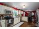 Stylish kitchen featuring modern appliances, elegant cabinets, and a functional layout, ideal for cooking and entertaining at 4441 Jim Wise Rd, Lincolnton, NC 28092