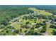 The property is nestled among green foliage and sprawling community. Home has great curb appeal and a large yard at 5211 Spring Gln, York, SC 29745