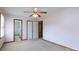 Bright bedroom with ensuite featuring neutral carpet and ceiling fan at 5211 Spring Gln, York, SC 29745
