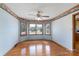 Bright dining area boasts hardwood floors and a ceiling fan at 5211 Spring Gln, York, SC 29745
