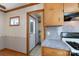 Kitchen with wood cabinets, countertops and a door to the outside at 5211 Spring Gln, York, SC 29745
