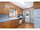 Kitchen with wood cabinets, countertops, hardwood floors and a back door at 5211 Spring Gln, York, SC 29745