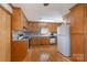 Well-lit kitchen features ample cabinetry, granite countertops, and an island at 5211 Spring Gln, York, SC 29745