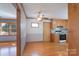 Eat-in kitchen features wood cabinets, hardwood floors, and stainless steel appliances at 5211 Spring Gln, York, SC 29745
