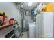 Convenient laundry area with shelving and storage space at 5211 Spring Gln, York, SC 29745