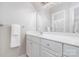 Clean bathroom with a single sink vanity and a large mirror at 5537 Challis View Ln, Charlotte, NC 28226