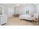 Bright bedroom with neutral colors, carpet flooring, and natural light from two windows at 5537 Challis View Ln, Charlotte, NC 28226
