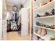Spacious walk-in closet with custom shelving and clothing racks for optimal storage solutions at 5537 Challis View Ln, Charlotte, NC 28226