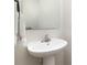 Bathroom featuring a pedestal sink, modern fixtures, and neutral color scheme at 5690 Granbury Dr, Kannapolis, NC 28081