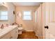 This bathroom is equipped with a vanity, toilet, and shower/tub combination at 701 Mcswain Rd, Shelby, NC 28150