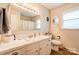 This bathroom showcases a vanity with a sink, toilet, and shower with tub at 701 Mcswain Rd, Shelby, NC 28150