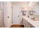 The bathroom features a single sink vanity, updated fixtures, and neutral wall paint at 701 Mcswain Rd, Shelby, NC 28150