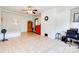 Large living room with tiled floors, a ceiling fan, and modern decor at 701 Mcswain Rd, Shelby, NC 28150