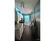 Bright kitchen with white cabinets, granite countertops, and stainless steel appliances at 7010 Executive Cir, Denver, NC 28037