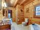 Bright bathroom with double vanity, tiled floors, and wood paneled walls at 720 Potneck Rd, Salisbury, NC 28147