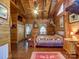 Charming bedroom featuring wood paneling, rustic decor, and warm lighting at 720 Potneck Rd, Salisbury, NC 28147
