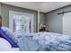 Bright bedroom with French doors and a comfortable bed at 720 Potneck Rd, Salisbury, NC 28147