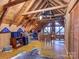 Versatile bonus room with wood-paneled walls, a desk area, and unique decor at 720 Potneck Rd, Salisbury, NC 28147